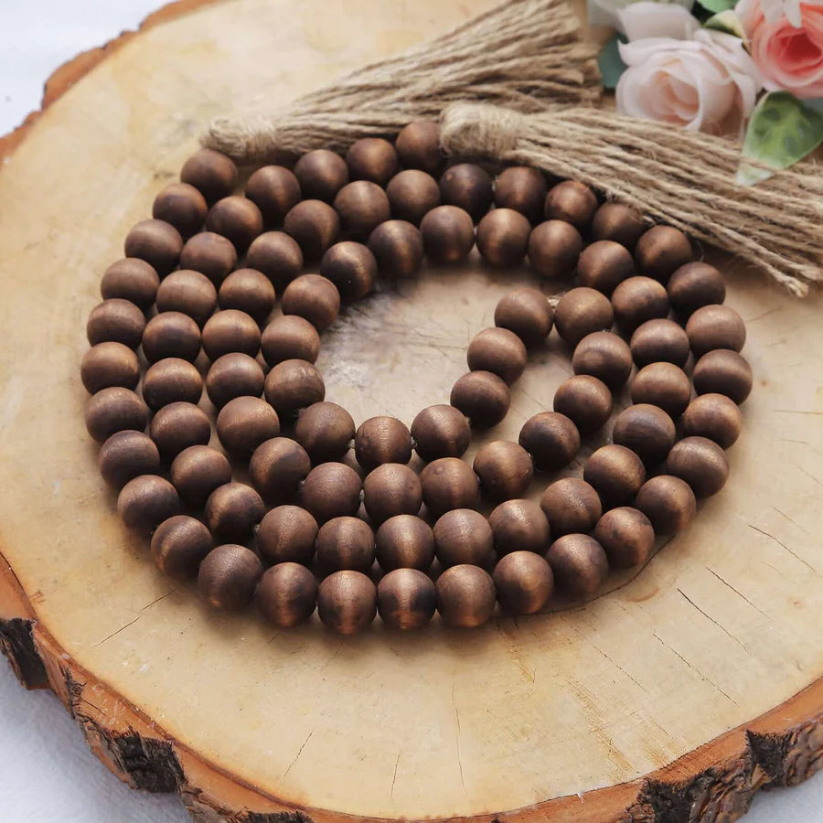 55" Brown Wood Bead Garland With Tassels
